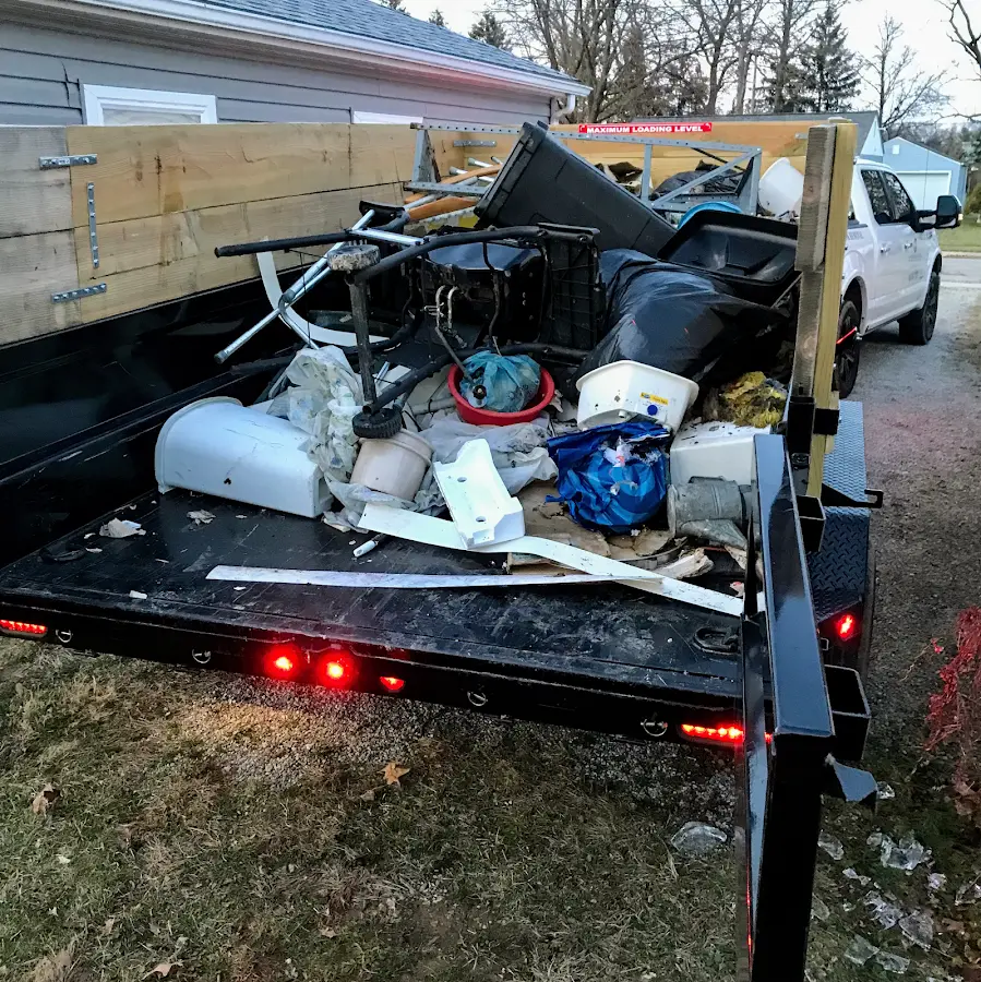 Roll-off dumpster delivered to a residential driveway in Gallup